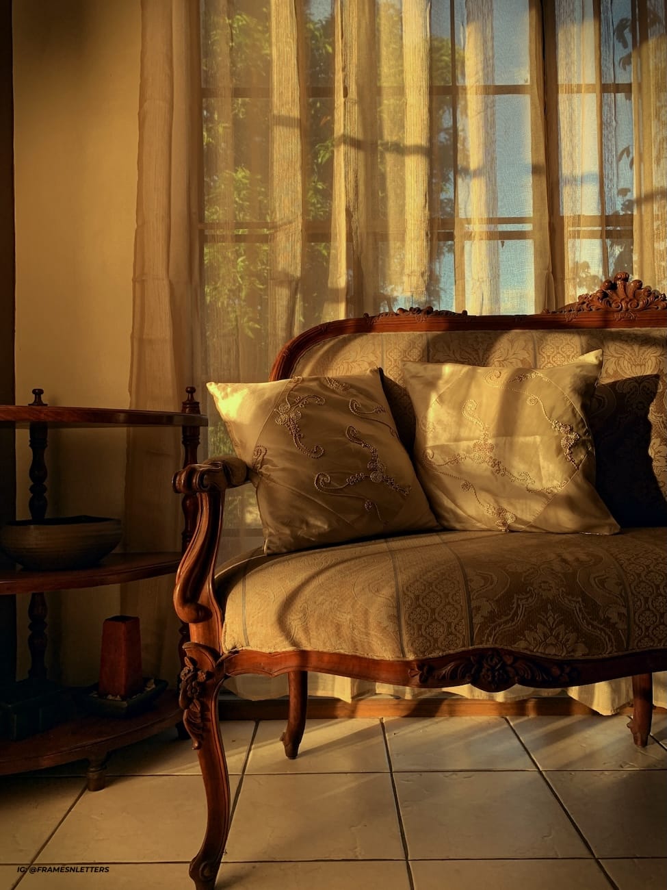 half a wooden couch during golden hour